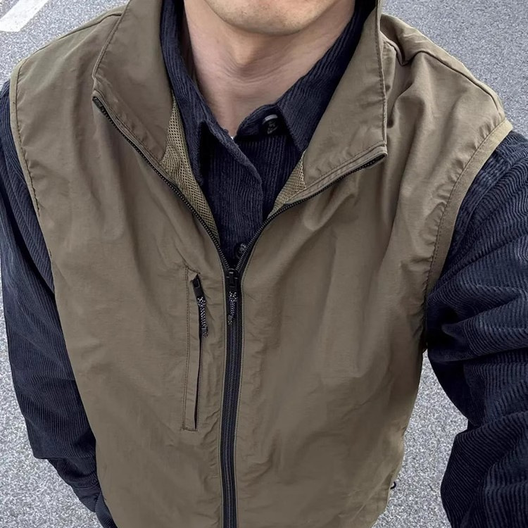 Olive-green Shirt Layered With A Trendy Brand Vest Jacket
